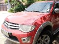 Selling Red Mitsubishi Strada 2012 at 60000 km -2