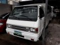 Selling White Mitsubishi L300 2012 Manual Diesel in Quezon City -4