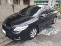Black 2011 Toyota Corolla Altis 1.6 V for sale in Makati-3