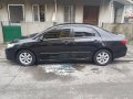 Black 2011 Toyota Corolla Altis 1.6 V for sale in Makati-2