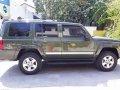 Green Jeep Commander 2008 at 109000 km for sale -7