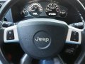 Green Jeep Commander 2008 at 109000 km for sale -3