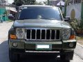 Green Jeep Commander 2008 at 109000 km for sale -0