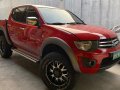 Selling Red Mitsubishi Strada 2011 Truck in Quezon City -0