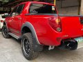 Selling Red Mitsubishi Strada 2011 Truck in Quezon City -2