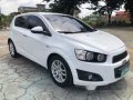 White Chevrolet Sonic 2013 Automatic Gasoline for sale -9