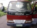 Selling Red Isuzu Elf 2009 Truck in Cavite -3