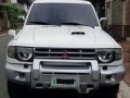 Selling White Mitsubishi Pajero 2004 at 140000 km -8