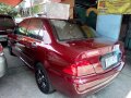 Red 2004 Mitsubishi Lancer for sale in Quezon City -1