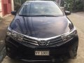 Selling Black Toyota Corolla Altis 2016 at 42000 km-6