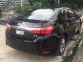 Selling Black Toyota Corolla Altis 2016 at 42000 km-4