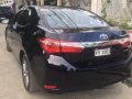 Selling Black Toyota Corolla Altis 2016 at 42000 km-5