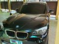 Selling Black Bmw X1 2011 at 20000 km -0