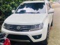 Selling Pearl White Suzuki Grand Vitara 2016 Automatic Gasoline at 26000 km-0