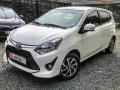 Selling White Toyota Wigo 2019 Hatchback at 5000 km -0