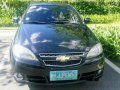 Black Chevrolet Optra 2008 at 70000 km for sale-6