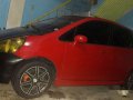 Red Honda Fit 2008 at 95000 km for sale-1