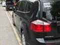 Black Chevrolet Orlando 2012 at 27000 km for sale -3