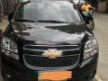 Black Chevrolet Orlando 2012 at 27000 km for sale -4