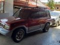 Sell Red 1999 Suzuki Vitara -0