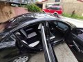 Sell Black 2012 Mazda 2 Sedan in Baguio-4