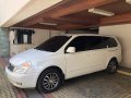 White Kia Carnival 2013 at 40000 km for sale-1