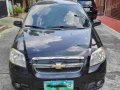 Selling Black Chevrolet Aveo 2012 Automatic Gasoline -4