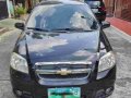 Selling Black Chevrolet Aveo 2012 Automatic Gasoline -4