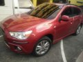 Red Mitsubishi Asx 2012 at 51000 km for sale -0