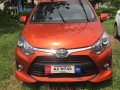 Orange Toyota Wigo 2018 for sale in Cainta-9