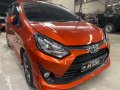Orange Toyota Wigo 2018 for sale in Quezon City -1