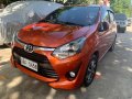 Orange Toyota Wigo 2017 for sale in Quezon City-0