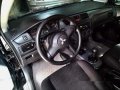 Selling Black Mitsubishi Lancer 2010 Manual Gasoline at 115000 km -0