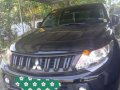 Selling Black Mitsubishi Strada 2018 Manual Diesel at 2043 km-0