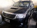 Selling Black Toyota Hilux 2014 Automatic Diesel at 58000 km -5