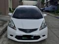 Selling White Honda Jazz 2010 at 77000 km -0