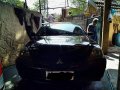 Selling Black Mitsubishi Lancer 2010 Manual Gasoline at 115000 km -8