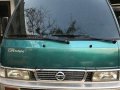 Green Nissan Urvan 2014 Manual Diesel for sale  -1