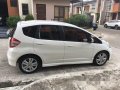 Selling White Honda Jazz 2010 at 77000 km -4