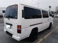White Nissan Urvan 2013 for sale Quezon City -5
