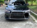 Selling Black Mitsubishi Lancer Ex 2014 at 21916 km -1