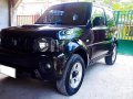 Black Suzuki Jimny 2015 at 55000 km for sale -1