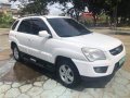 Selling White Kia Sportage 2009 in Talisay-0