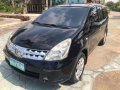 Selling Black Nissan Grand Livina 2009 at 1 km-7