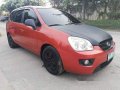 Orange Kia Carens 2007 for sale in Talisay-9