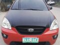 Orange Kia Carens 2007 for sale in Talisay-8