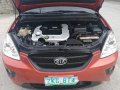 Orange Kia Carens 2007 for sale in Talisay-9