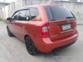 Orange Kia Carens 2007 for sale in Talisay-7