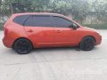 Orange Kia Carens 2007 for sale in Talisay-5