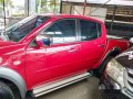 Selling Red Mitsubishi Strada 2010 in Quezon City-4